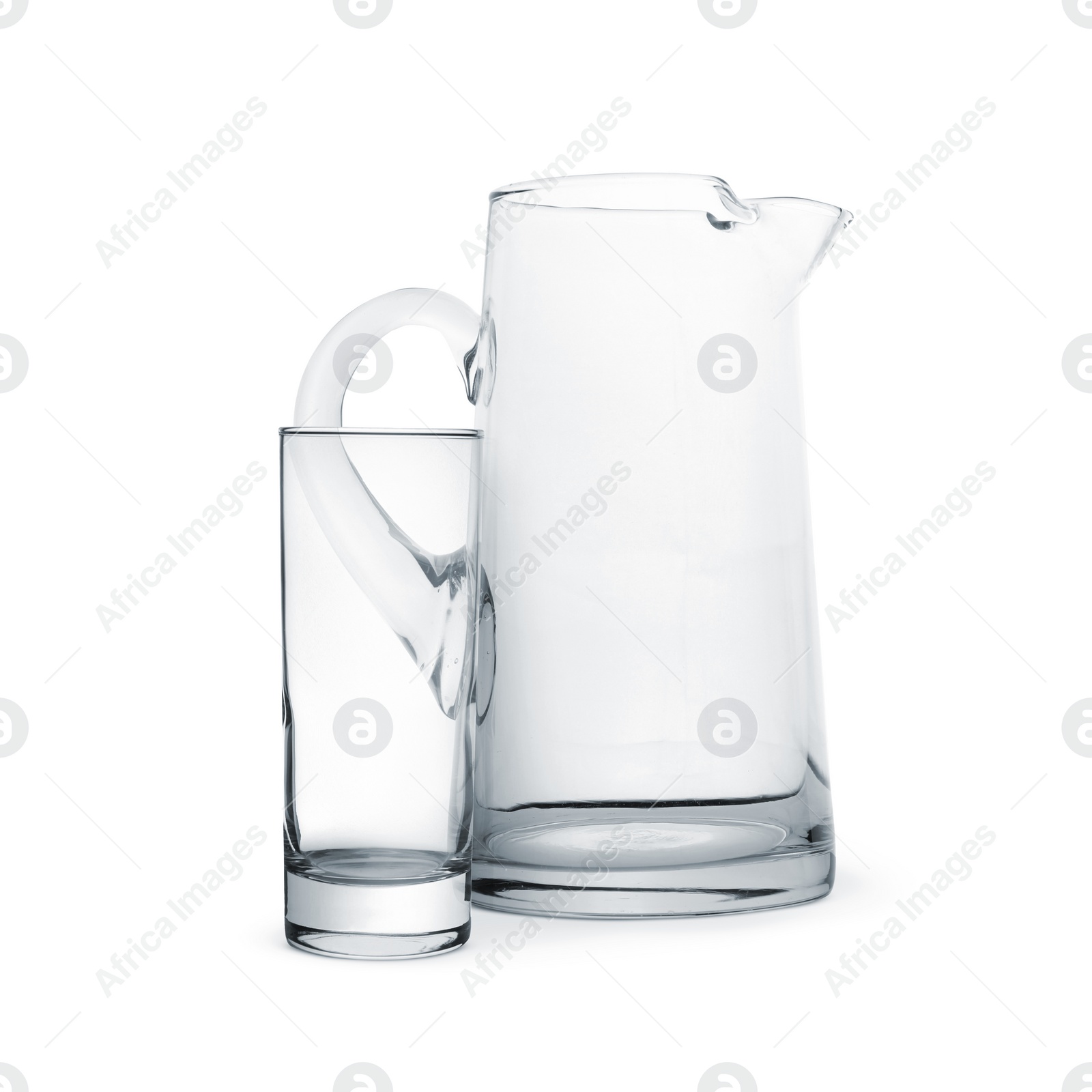 Image of Empty glass and jug isolated on white