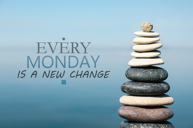 Image of Every Monday Is A New Change - motivational quote. Stack of stones near sea
