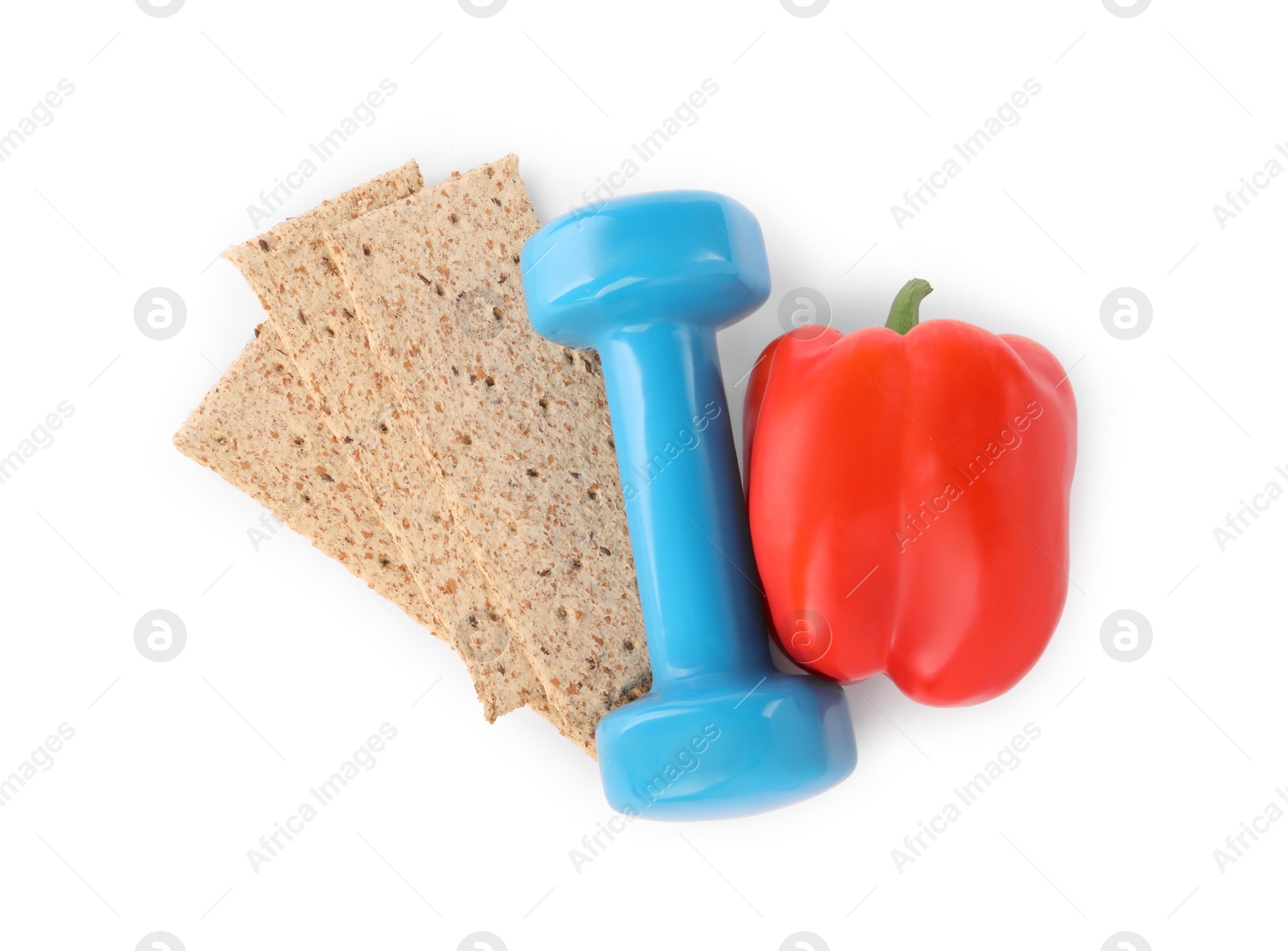 Photo of Healthy diet. Crispbreads, bell pepper and dumbbell isolated on white, top view