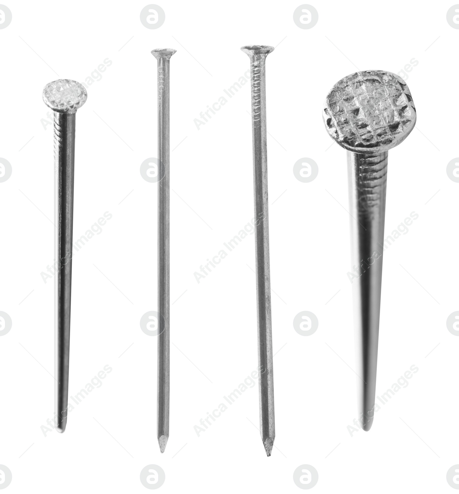 Image of Set with sharp metal nails on white background 