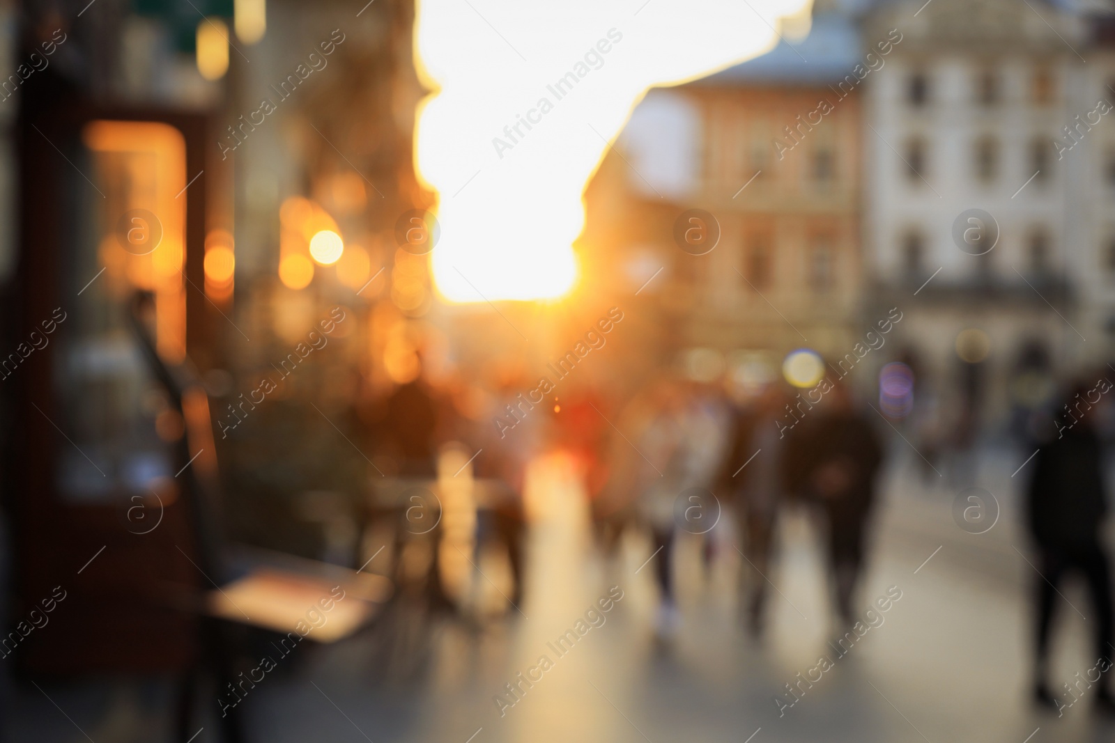 Photo of Blurred view of people walking on city street