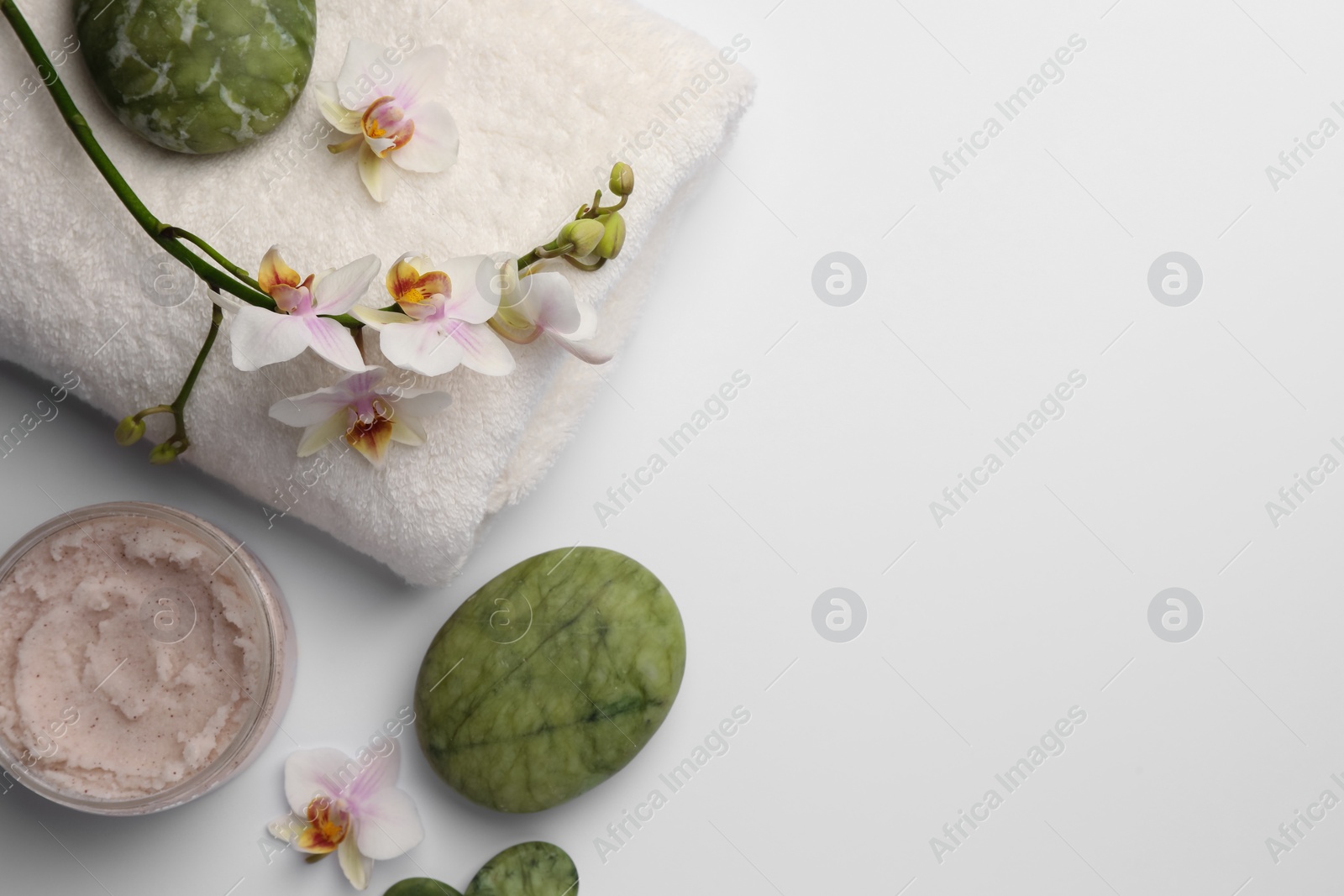 Photo of Flat lay composition with different spa products on white background. Space for text