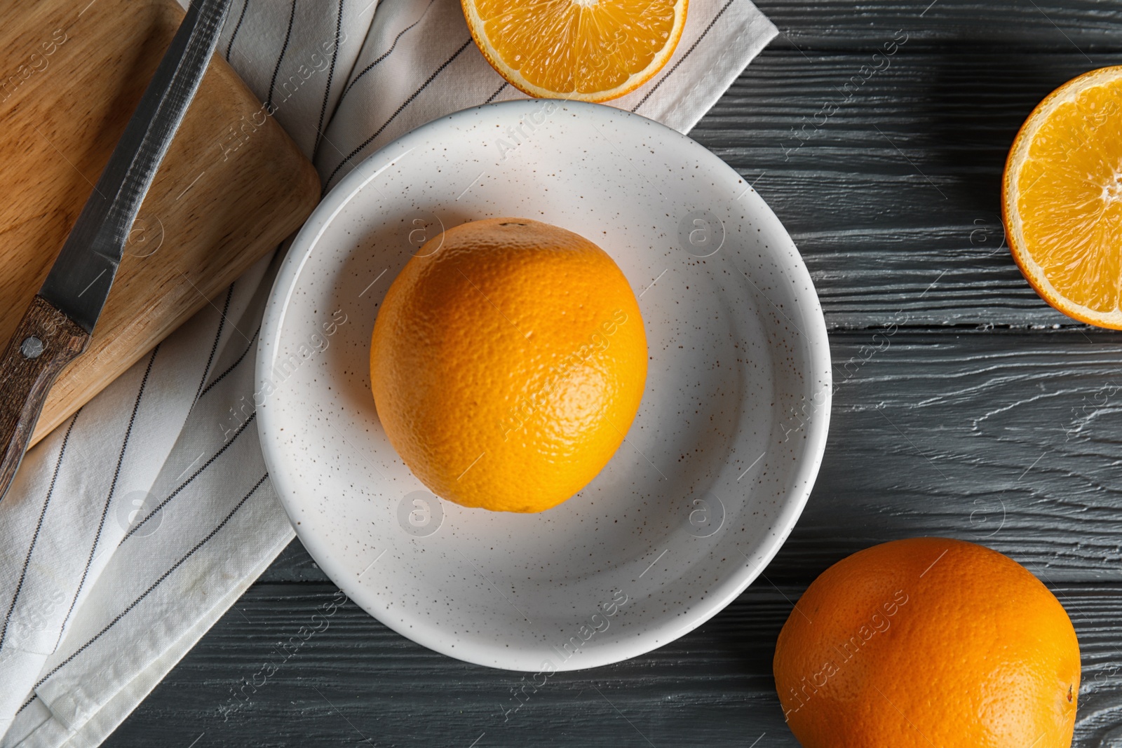 Photo of Flat lay composition with fresh oranges on wooden table