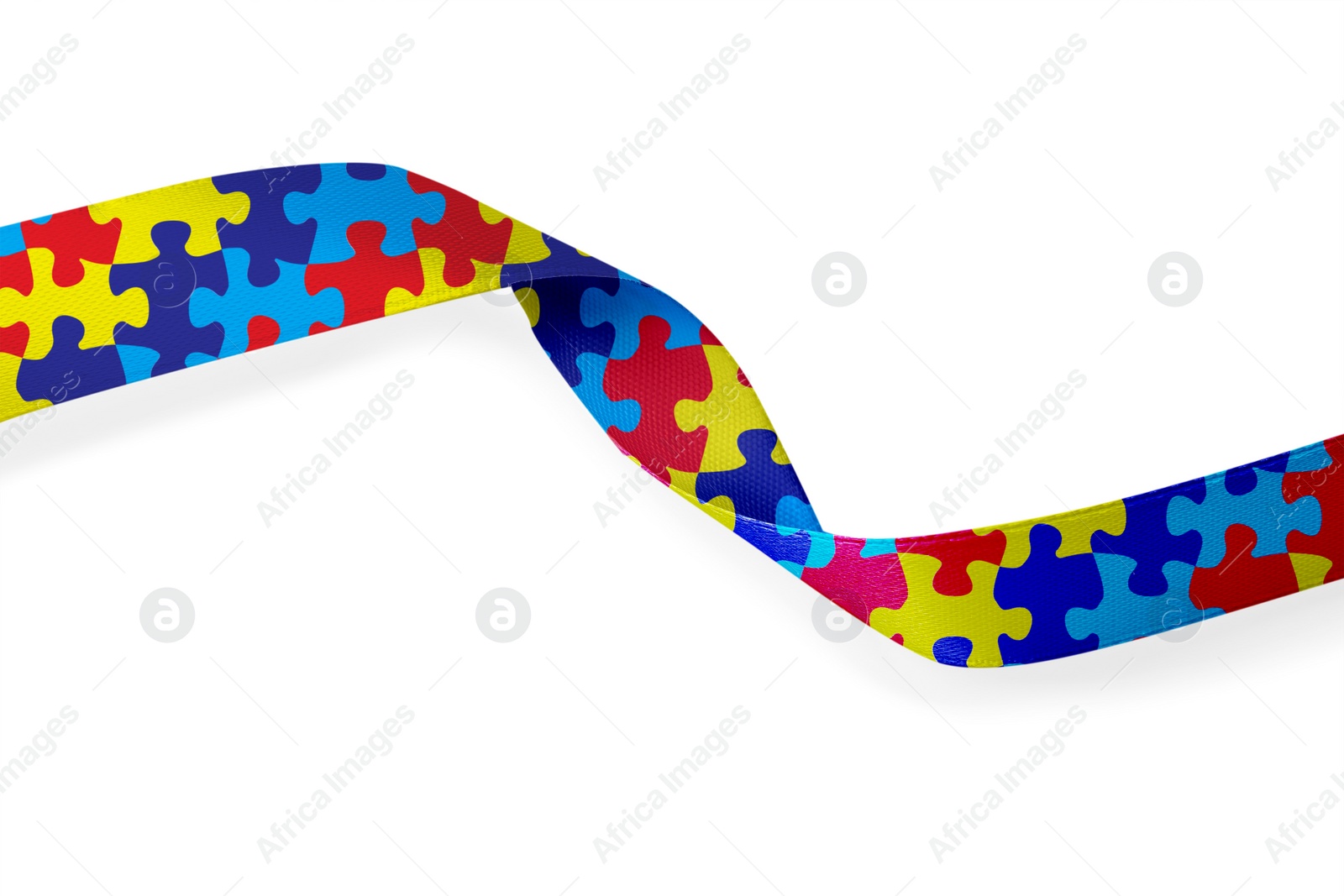 Image of World Autism Awareness Day. Colorful puzzle ribbon on white background