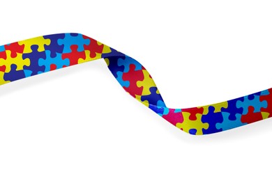 Image of World Autism Awareness Day. Colorful puzzle ribbon on white background