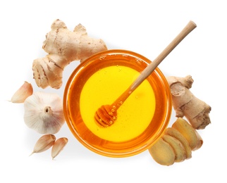 Photo of Ginger, honey and fresh garlic on white background, top view. Natural cold remedies