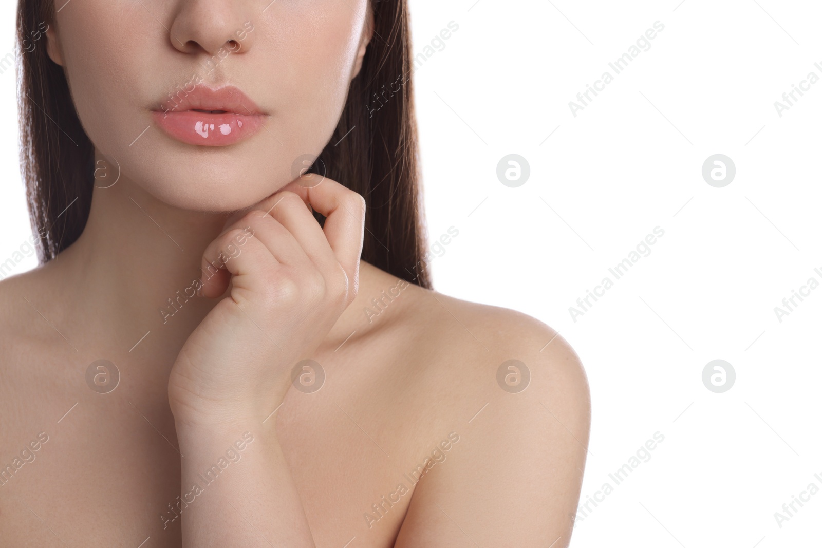 Photo of Closeup view of woman with beautiful full lips on white background