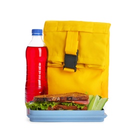 Lunch box with appetizing food, bottle of drink and bag on white background