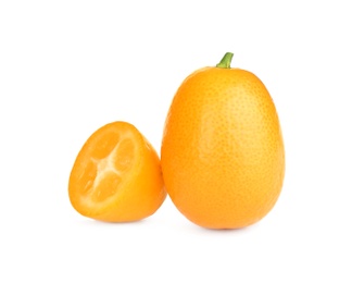 Whole and cut ripe kumquats on white background. Exotic fruit