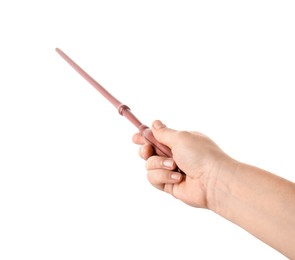Photo of Woman holding magic wand on white background, closeup