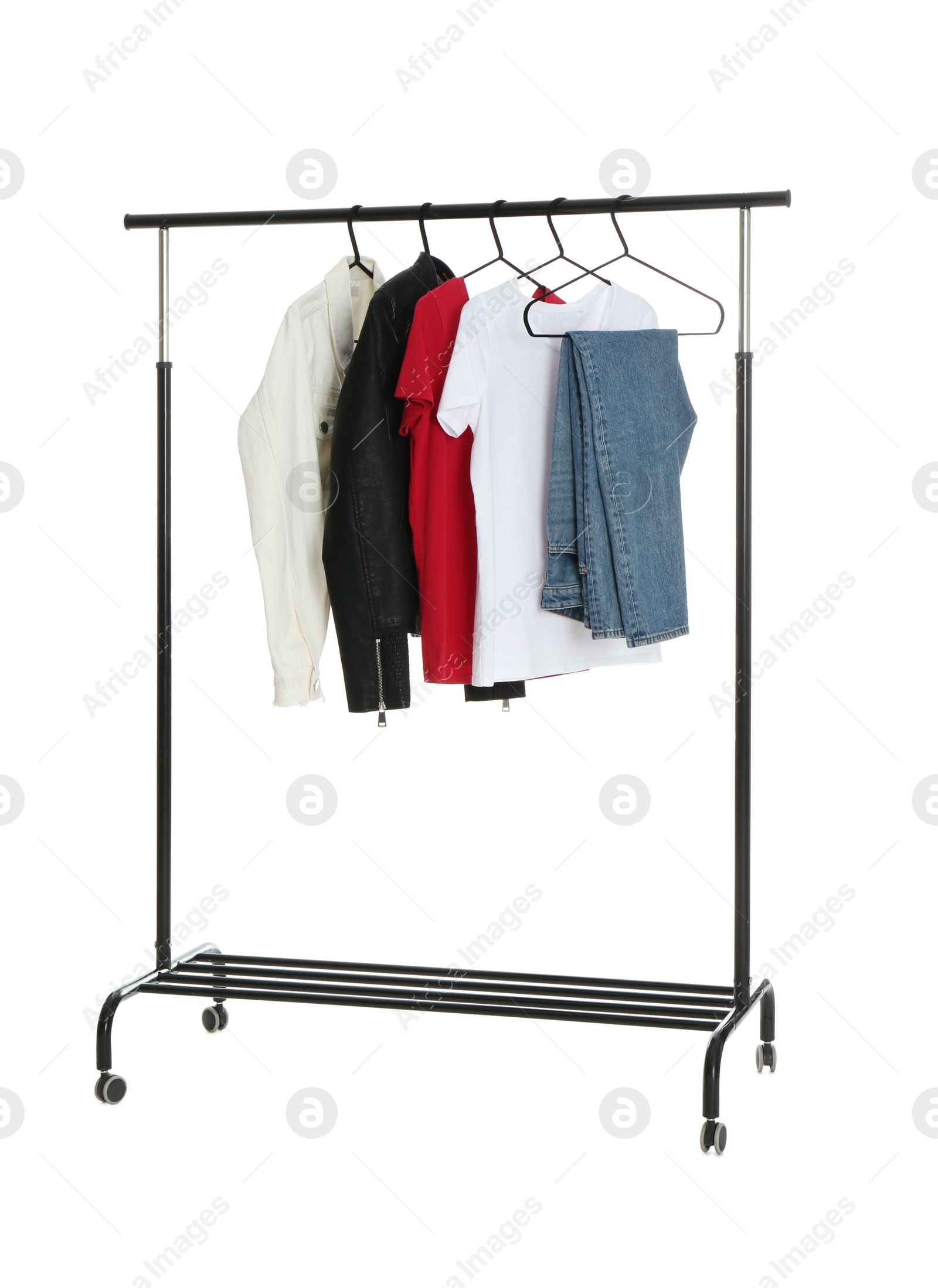 Photo of Rack with stylish women's clothes isolated on white