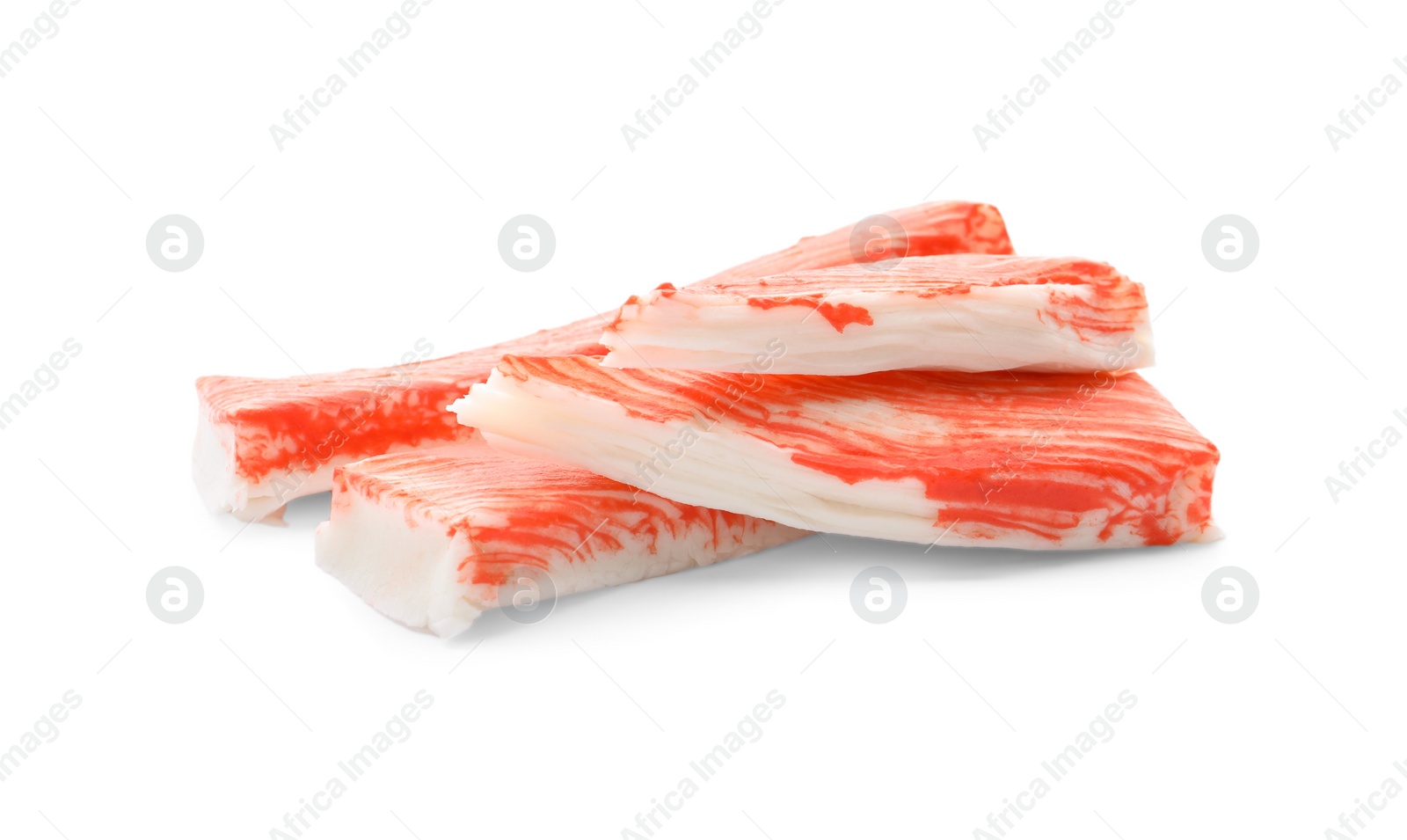 Photo of Cut and whole crab sticks isolated on white