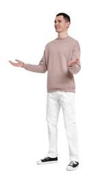 Handsome young man greeting someone on white background