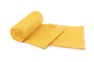 Roll of yellow garbage bags isolated on white