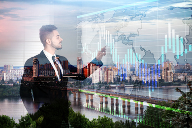 Image of Multiple exposure of businessman, graph and cityscape