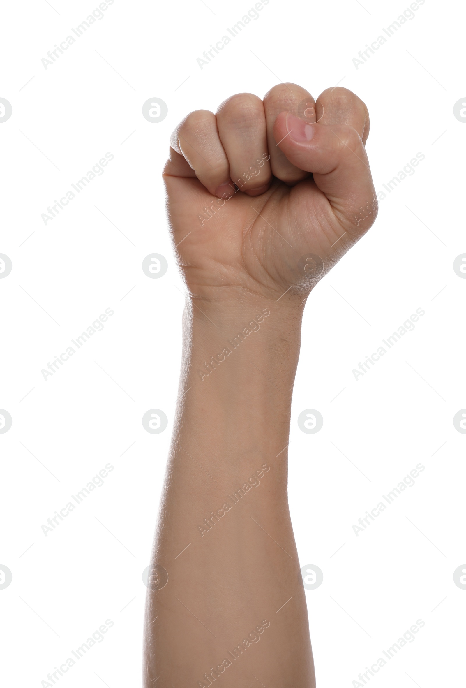 Photo of Man with raised fist against white background, closeup of hand