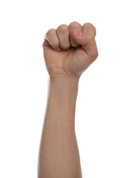 Photo of Man with raised fist against white background, closeup of hand