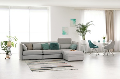 Photo of Modern living room interior with comfortable sofa