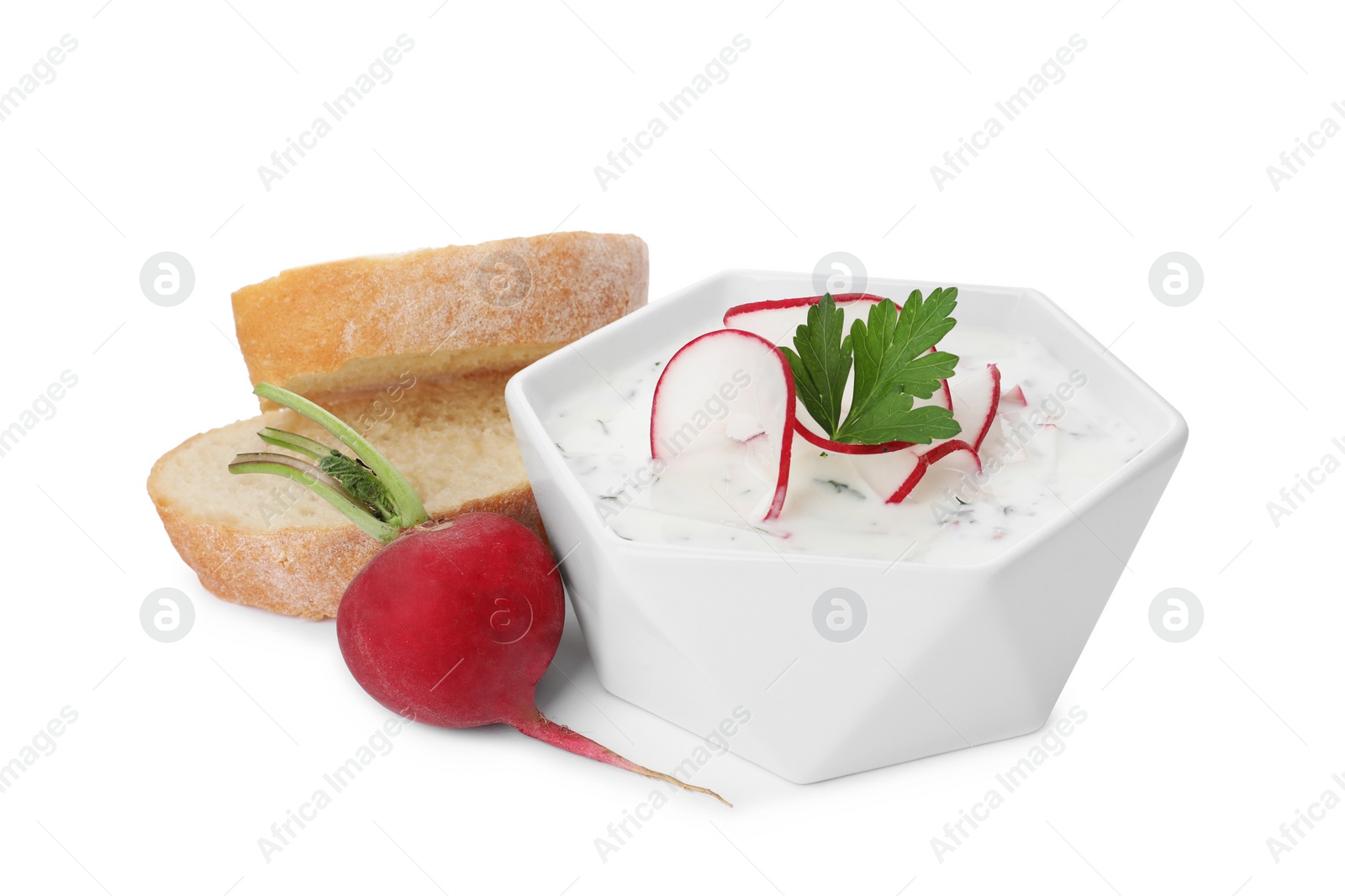 Photo of Delicious cold summer soup and bread on white background