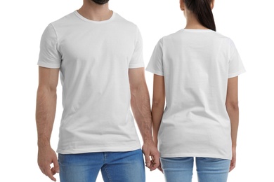 Young couple in t-shirts on white background. Mockup for design