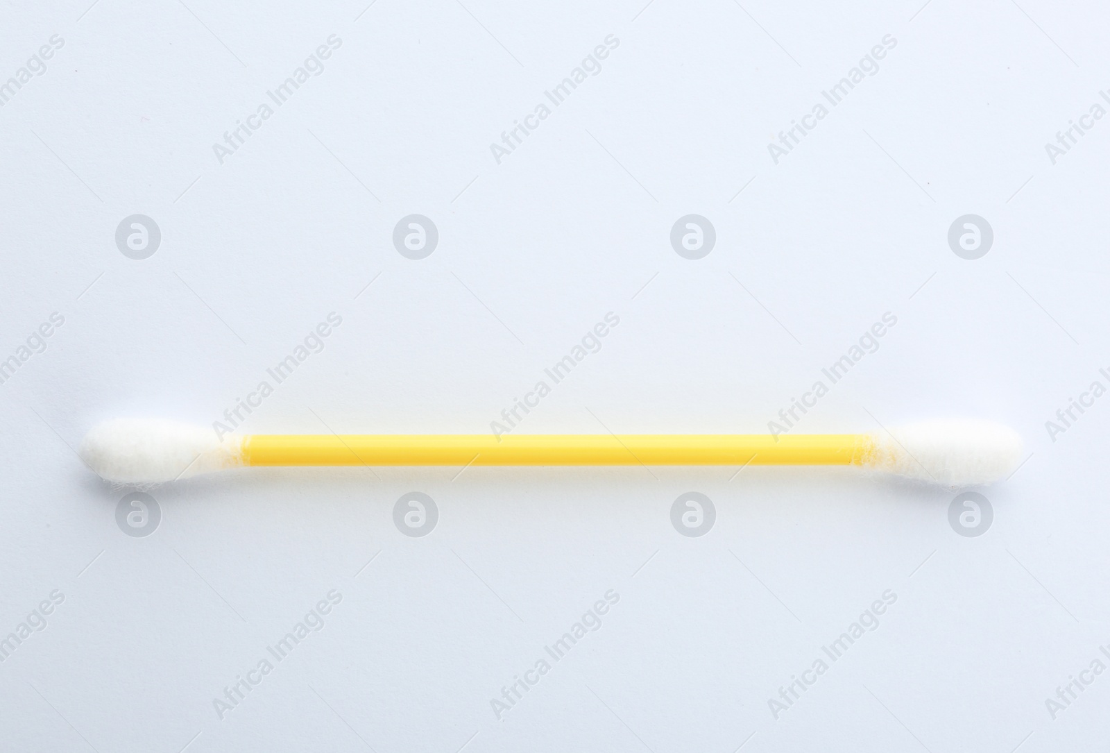 Photo of Plastic cotton swab on white background, top view