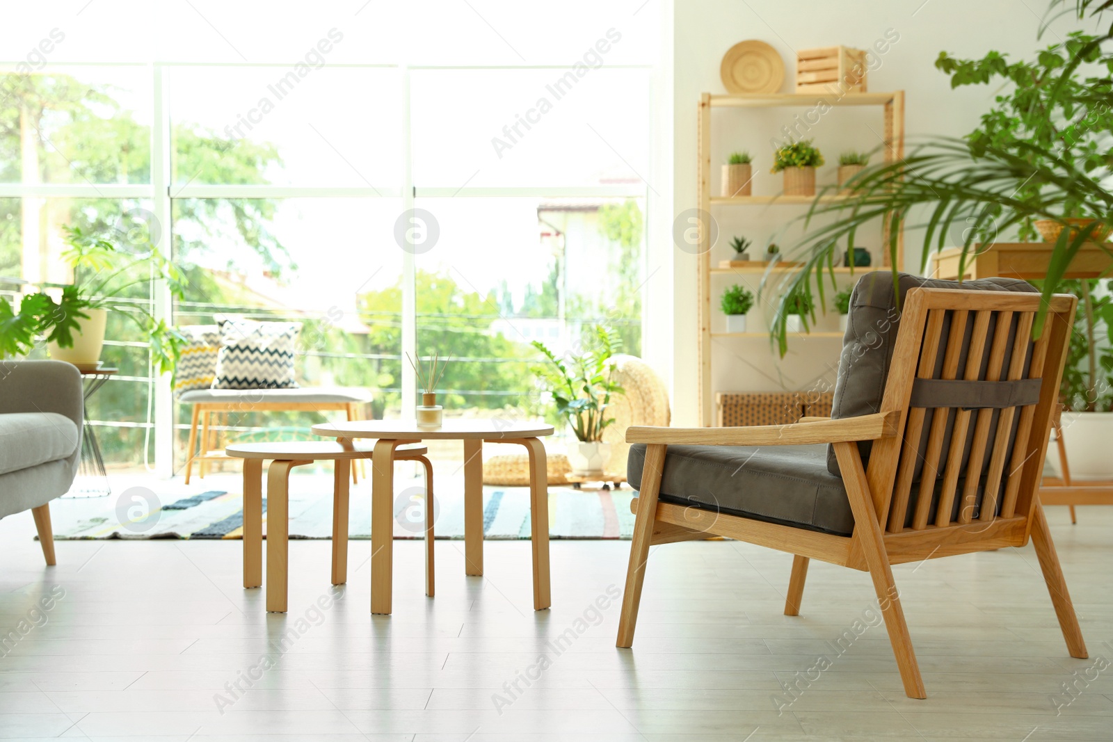 Photo of Modern living room interior with comfortable armchair