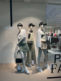 Photo of Warsaw, Poland - July 26, 2022: Display of fashion store in shopping mall