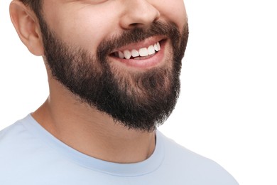 Photo of Man with clean teeth smiling on white background, closeup