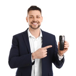 Man with modern breathalyzer on white background