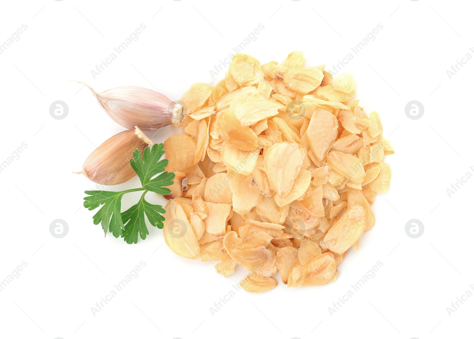 Photo of Dried garlic flakes and parsley on white background, top view