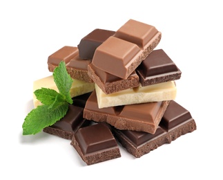 Different kinds of chocolate with mint on white background