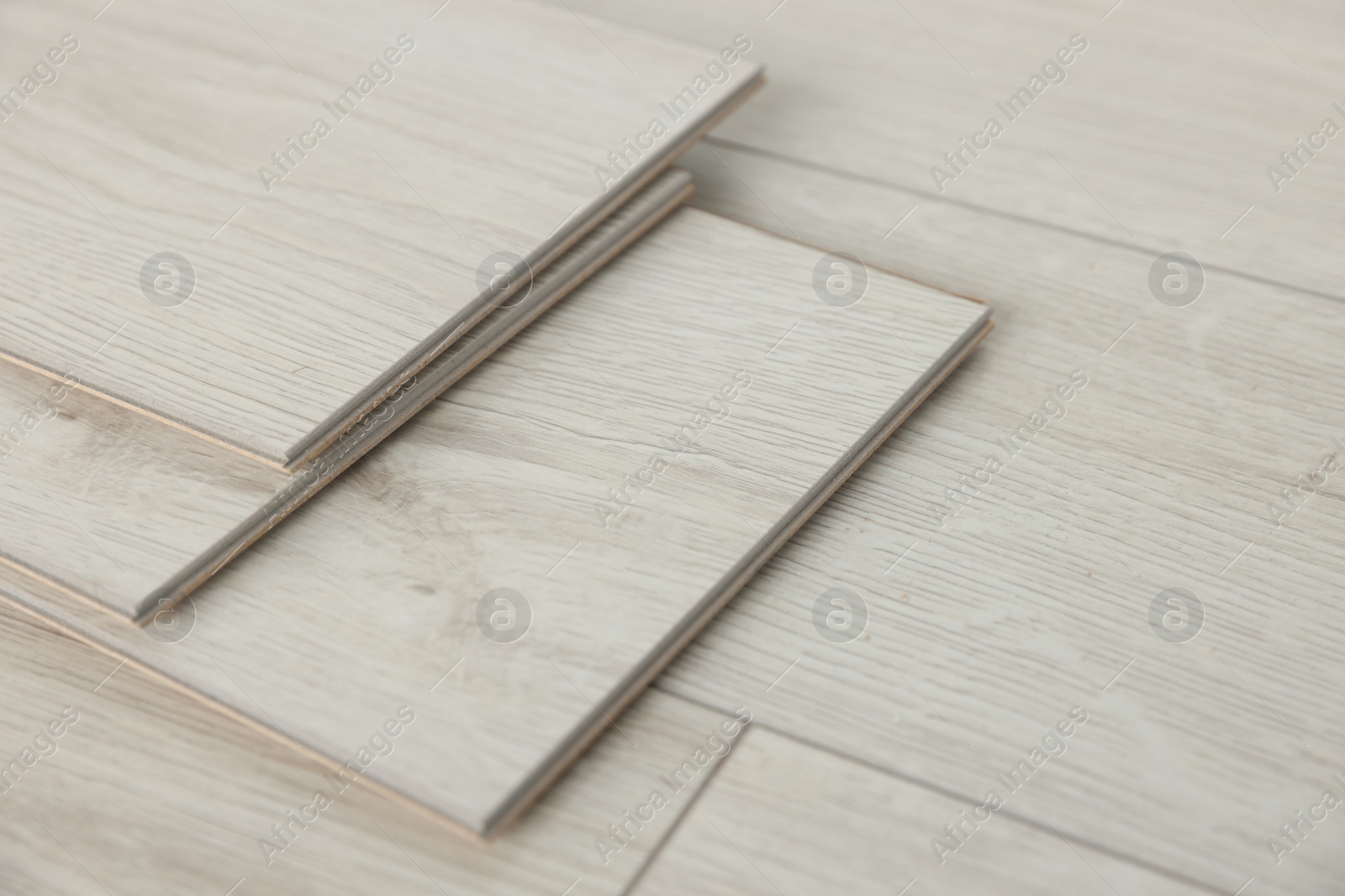 Photo of Parquet planks on floor in room prepared for renovation, closeup