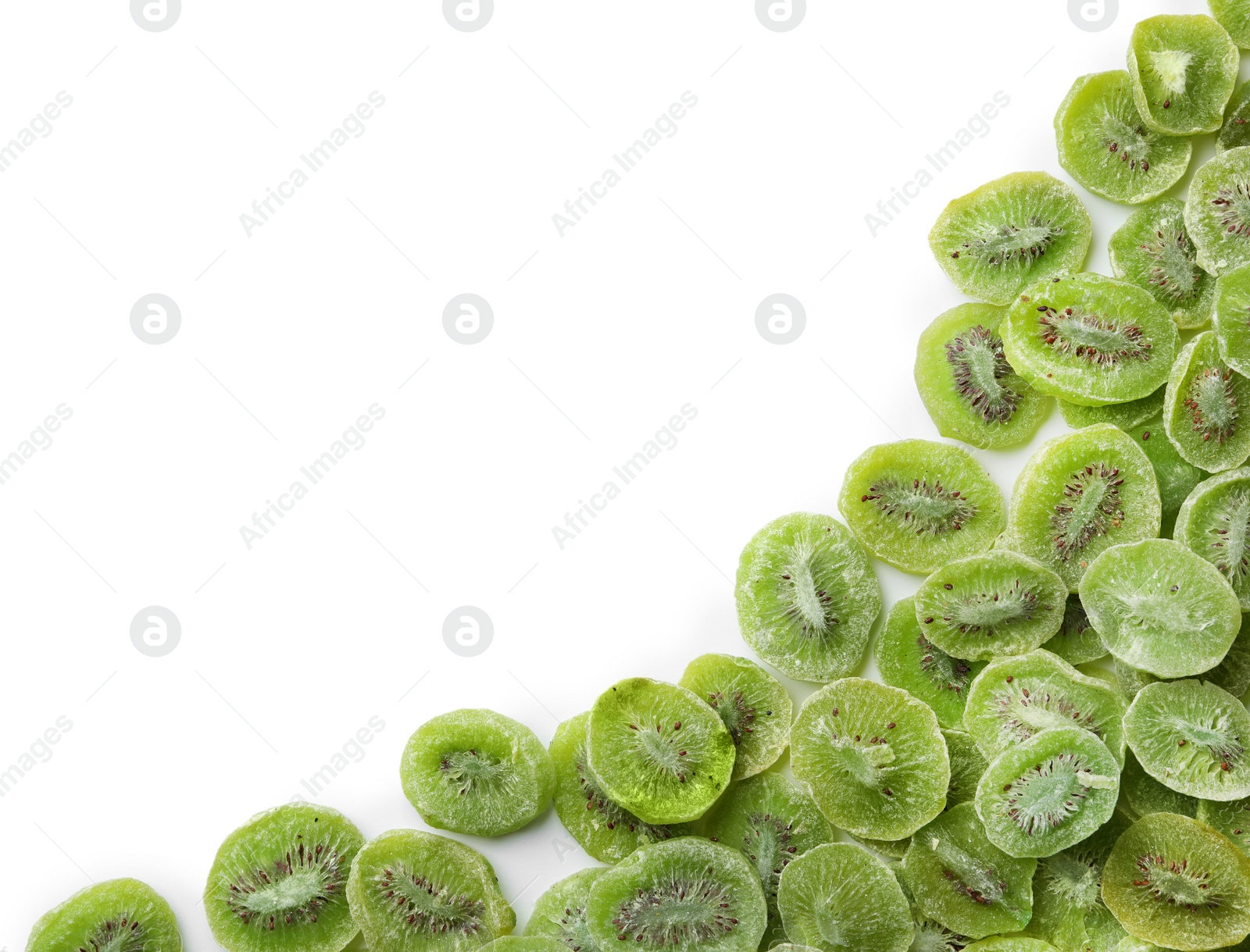 Photo of Frame made of kiwi on white background, flat lay. Dried fruit as healthy food