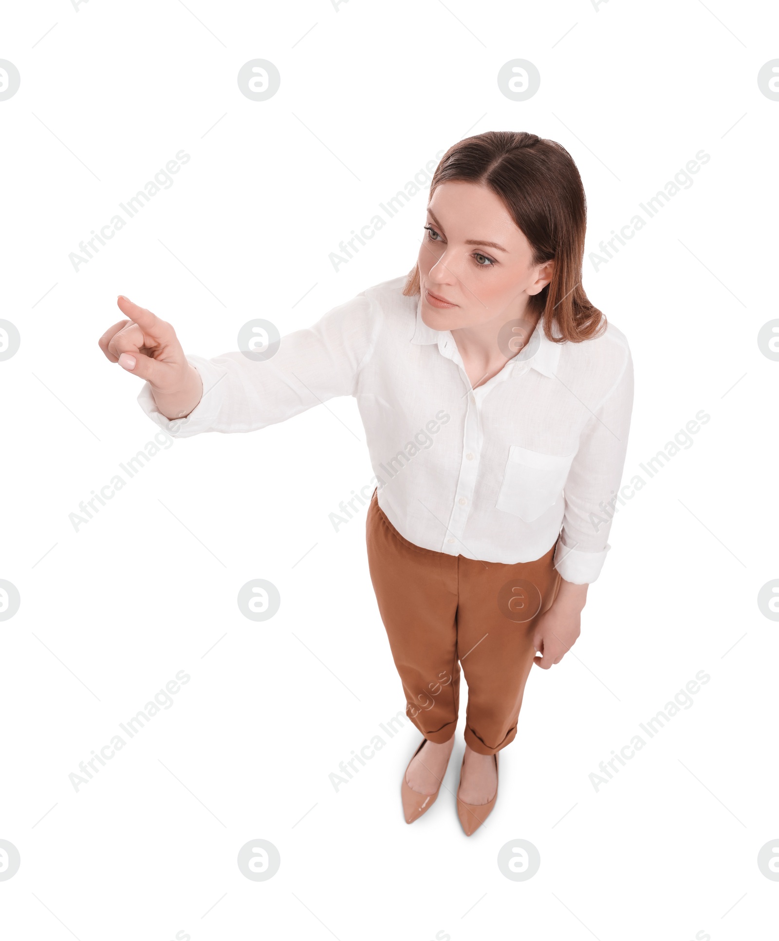 Photo of Beautiful businesswoman pointing at something on white background, above view