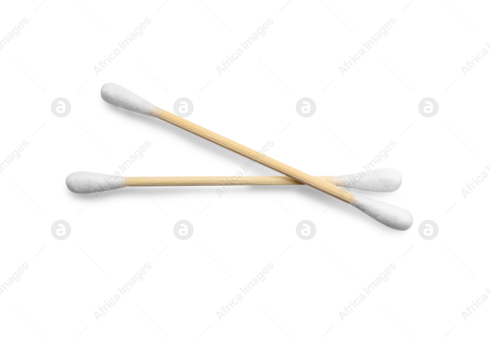 Photo of Wooden cotton buds on white background, top view