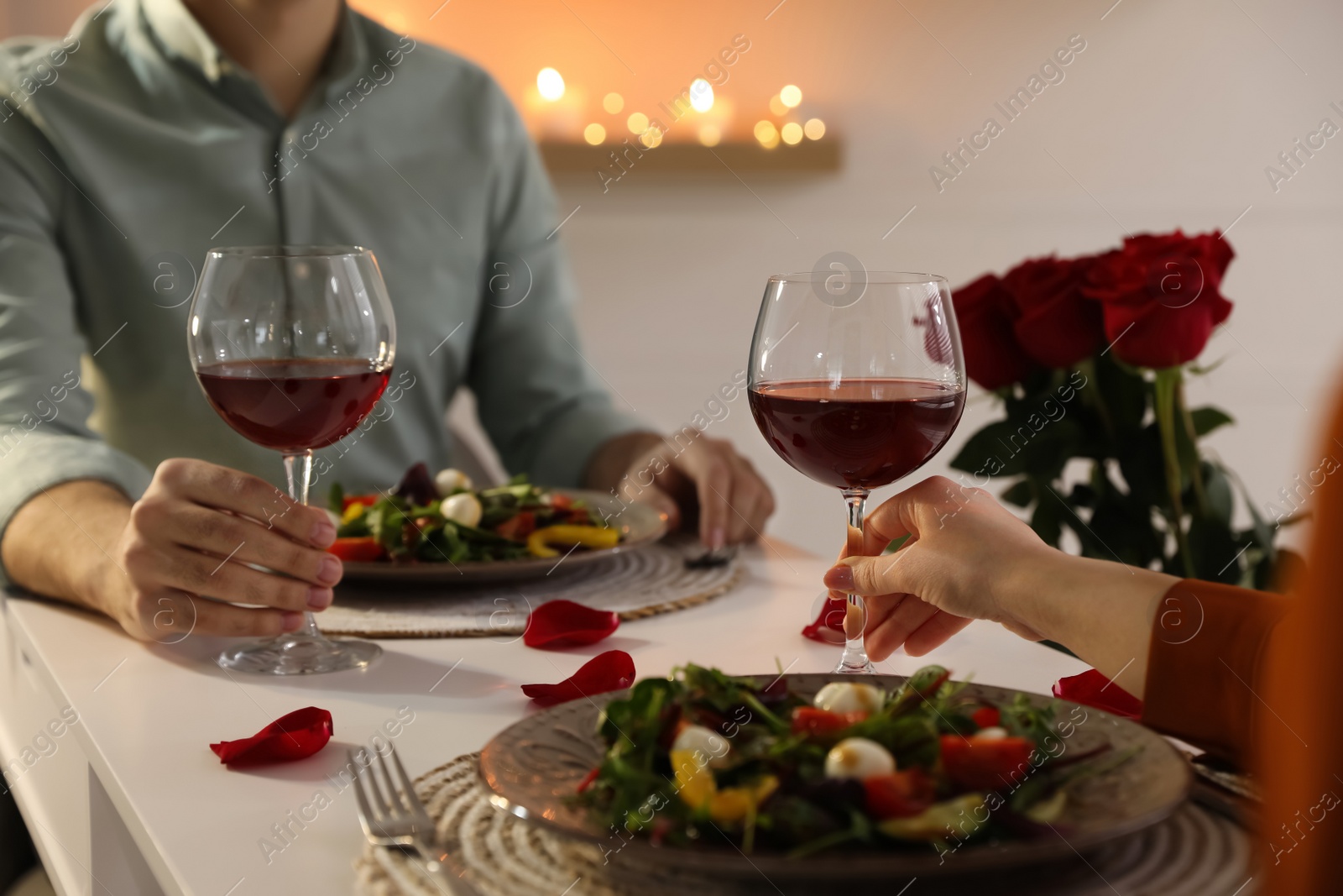 Photo of Couple having romantic dinner at home, closeup