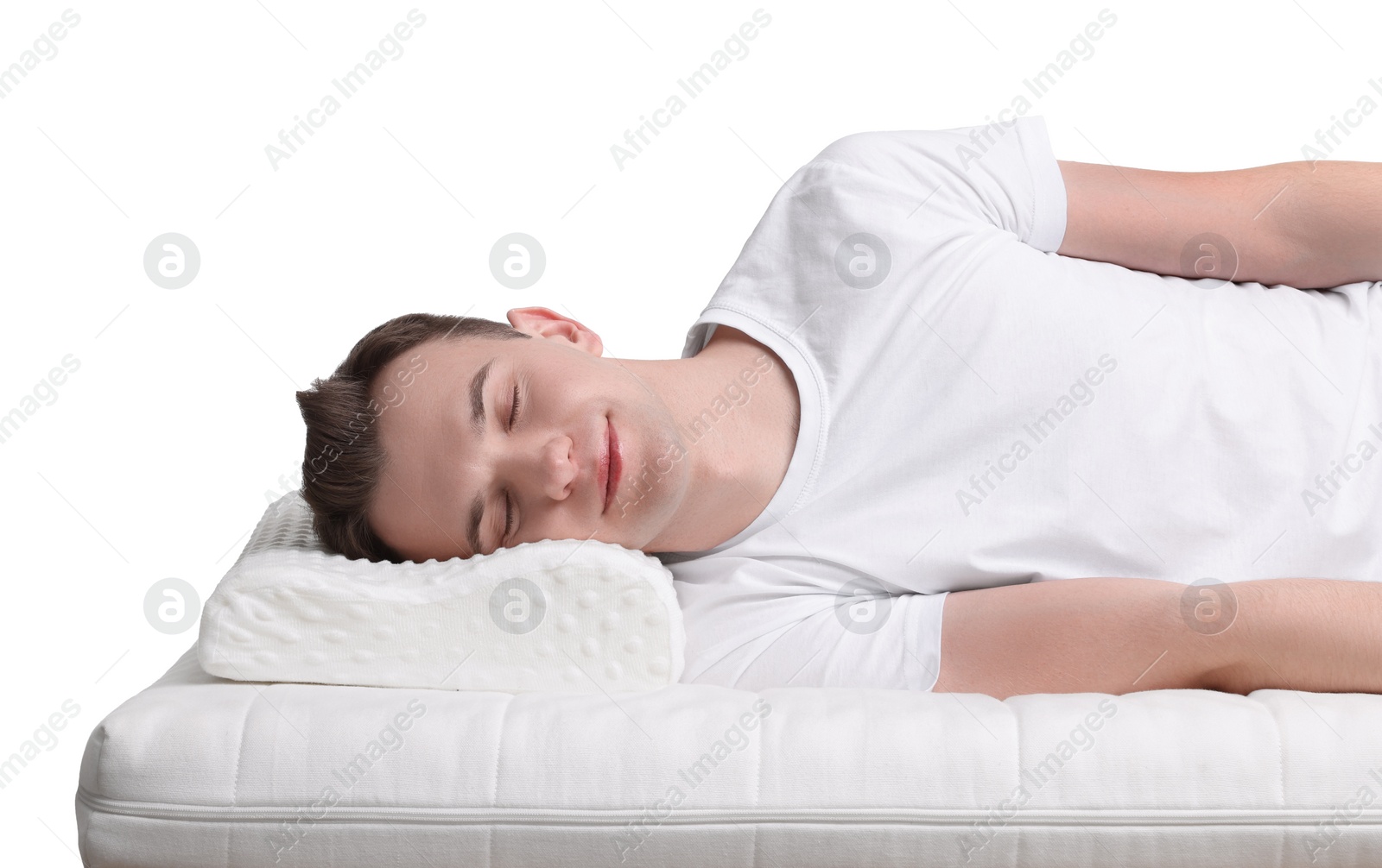 Photo of Man lying on orthopedic pillow against white background