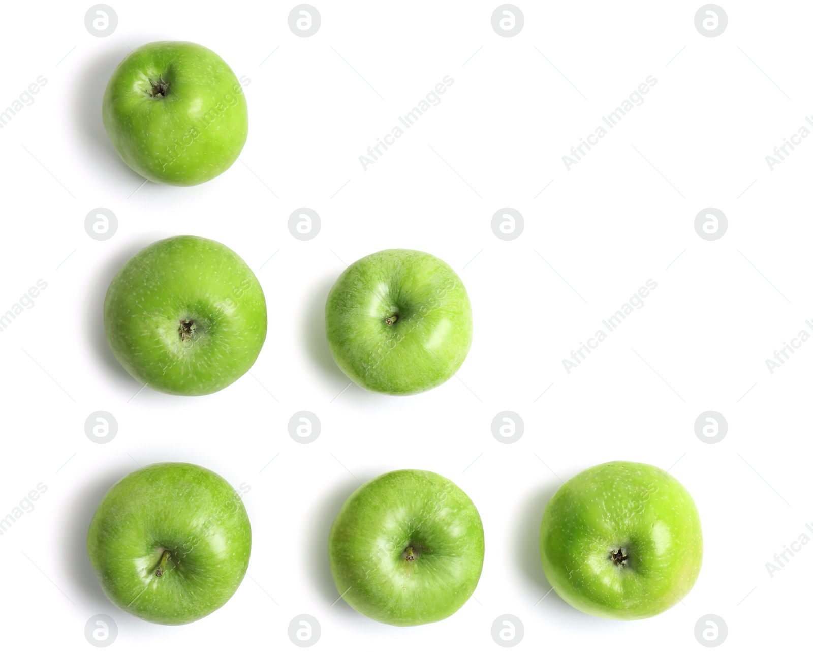 Photo of Fresh green apples on white background, top view