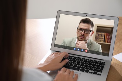 Woman using laptop for online studying, closeup. Webinar concept