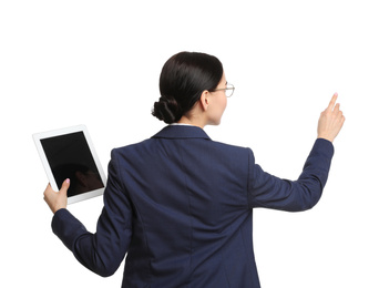 Young businesswoman with tablet on white background