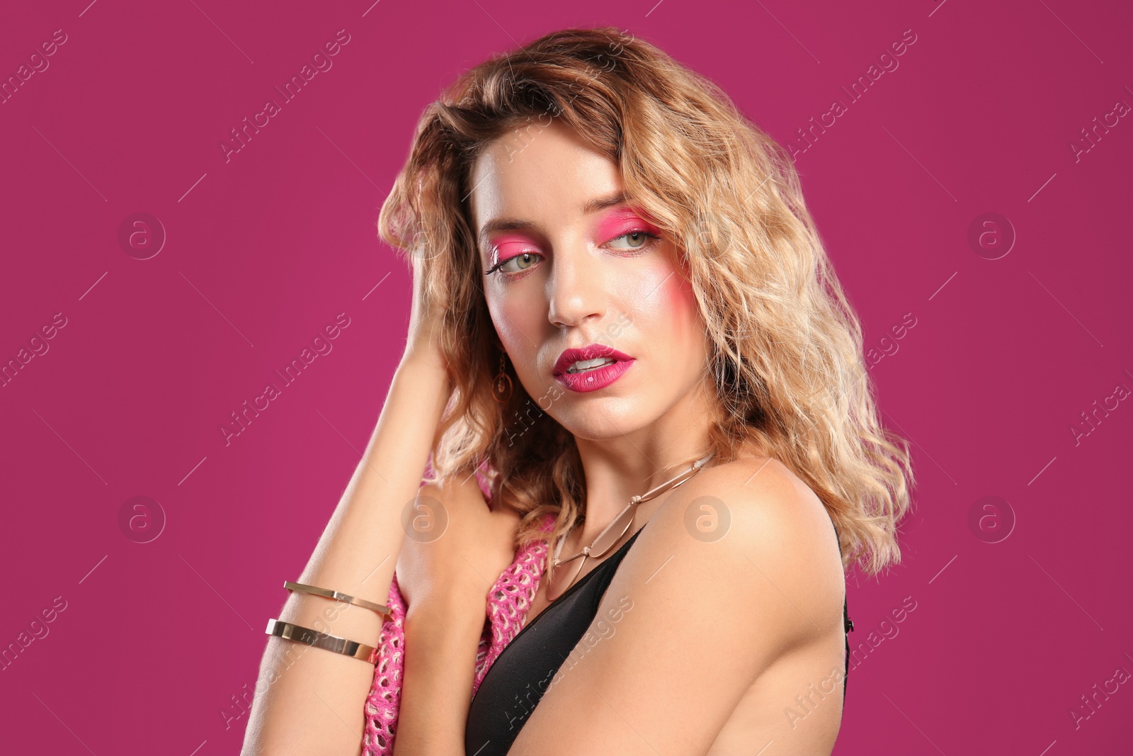 Photo of Beautiful young woman posing on color background. Summer fashion