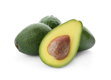 Ripe avocados on white background. Tropical fruit