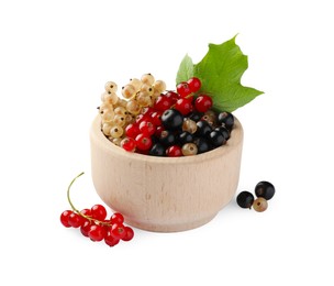 Photo of Fresh red, white and black currants in bowl with green leaf isolated on white