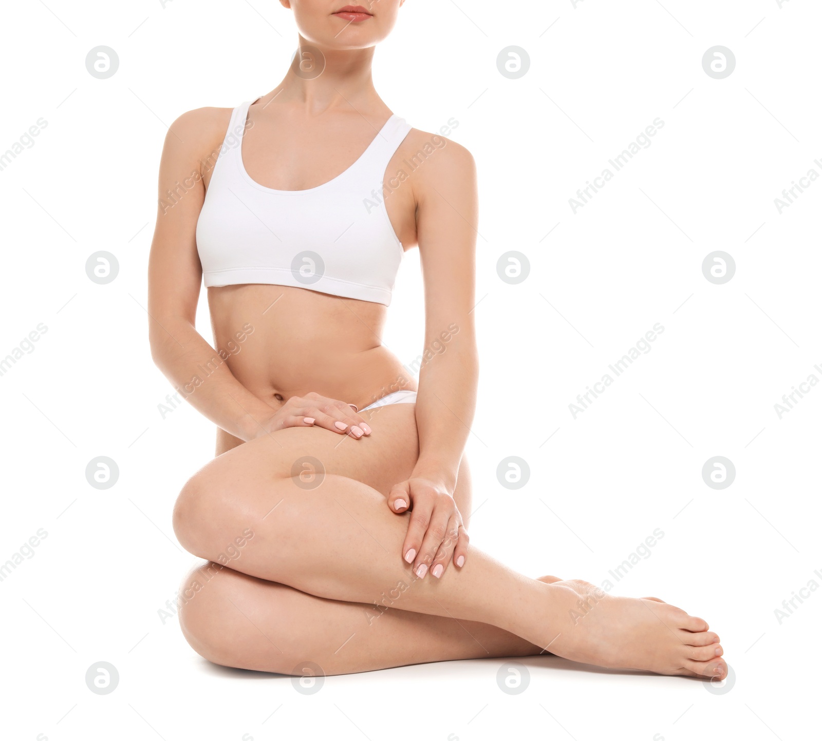 Photo of Young woman showing smooth silky skin after epilation on white background