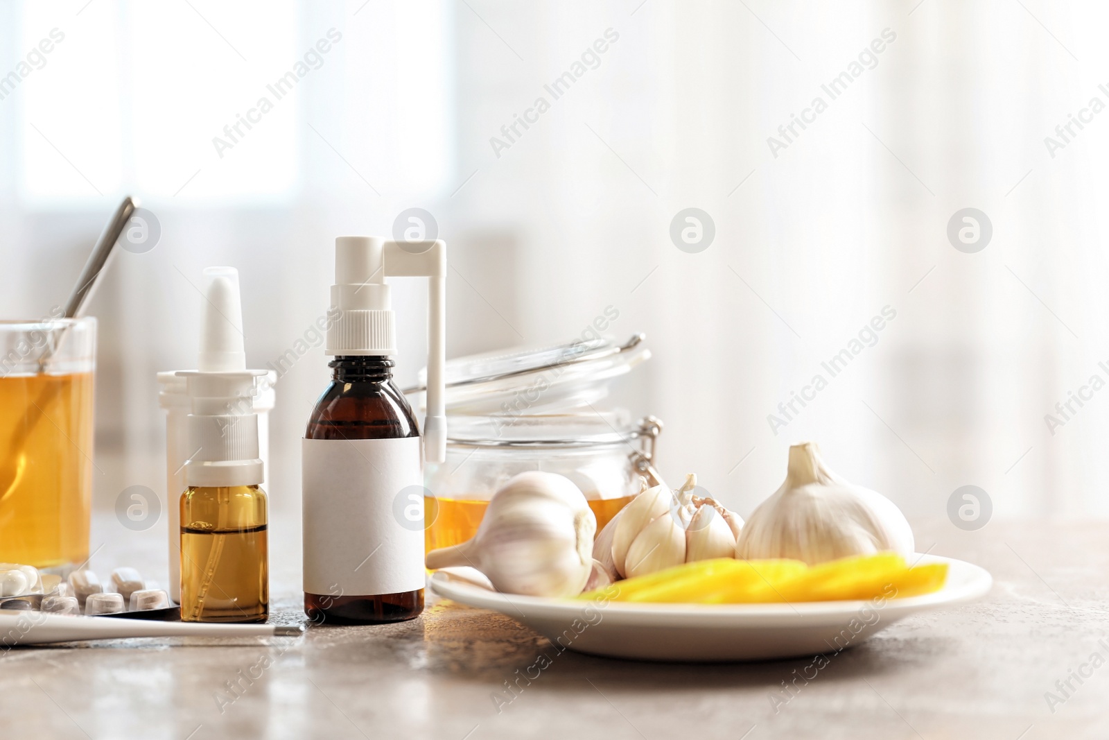 Photo of Natural and medical cold remedies on table