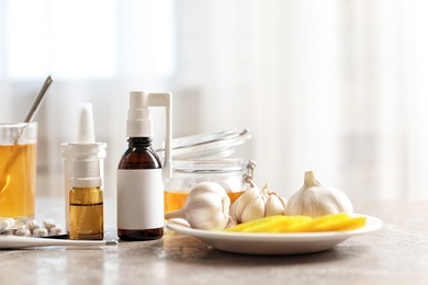 Photo of Natural and medical cold remedies on table