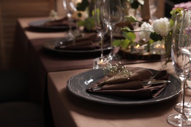 Photo of Elegant table setting with beautiful floral decor