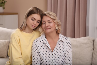 Young woman with her mom at home. Happy Mother's Day