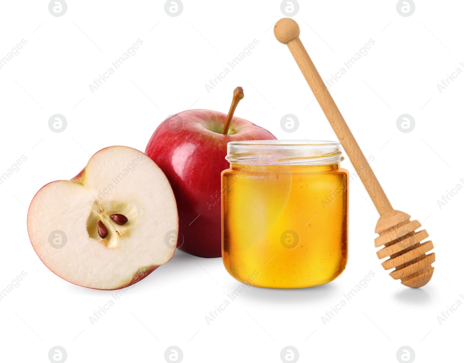 Image of Honey in glass jar, apples and dipper isolated on white