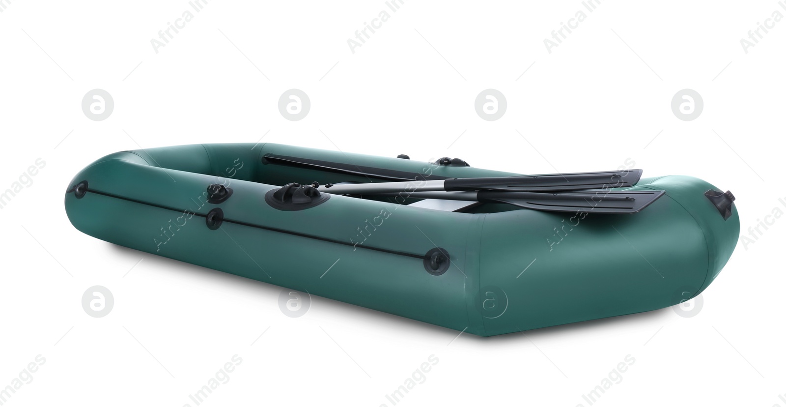 Photo of Inflatable rubber fishing boat with aluminium oars isolated on white